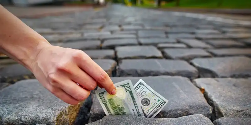 Nằm mơ thấy nhặt được tiền là điềm hên hay xui?
